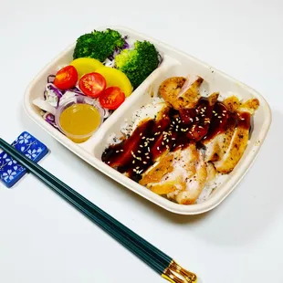 a bento box of food
