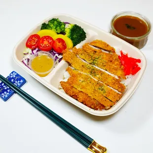 a bento box of food