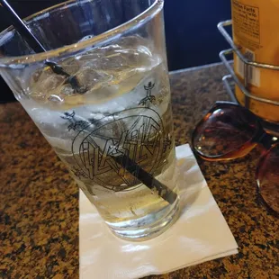 a glass of water with ice