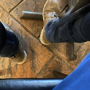 a view of a person&apos;s feet from above