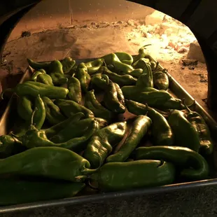 Freshly roasted Hatch green chile.  Served on our famous Gabriella pizza ~ Hatch green chile and spicy pepperoni.