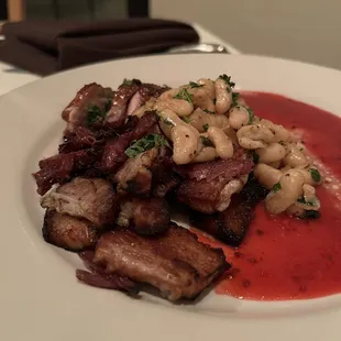 Duck and pork belly with blackberry sauce