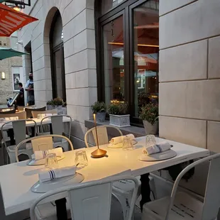 tables and chairs outside a restaurant
