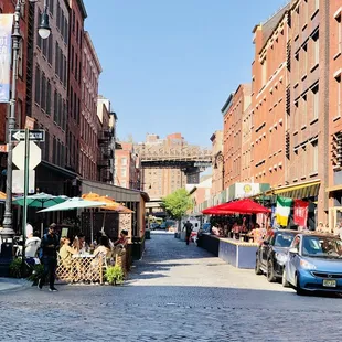 a cobblestone street in a city