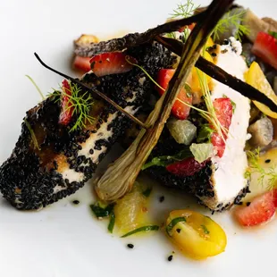 sesame crusted wild swordfish with strawberry lemon gramolada, mad apple, confit spring onions + patio mint