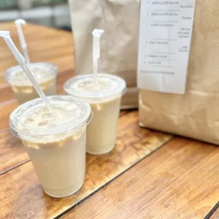three cups of coffee on a table