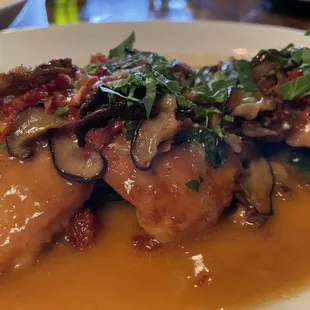 Chicken marsala with spinach, mushrooms and dried tomatoes.