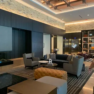 a modern living room with a fireplace