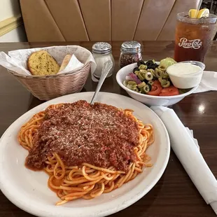 Italian spaghetti with hot garlic bread and crisp side salad. Sweet tea drink