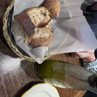 Bread basket with homemade Parmesan garlic olive oil