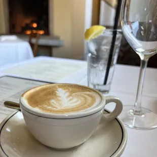 a cup of coffee on a saucer