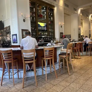 a man sitting at a bar