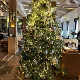Christmas tree inside the entrance of the restaurant.
