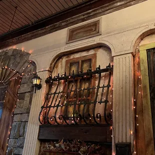 a balcony decorated with christmas lights