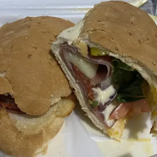 Italian Sub - lettuce, tomatoes, onions, banana peppers, mayo, and Italian dressing