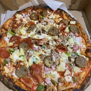 The Works with pineapples instead of olives