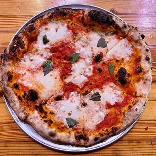 Margherita Pizza: only $6 during happy hour!