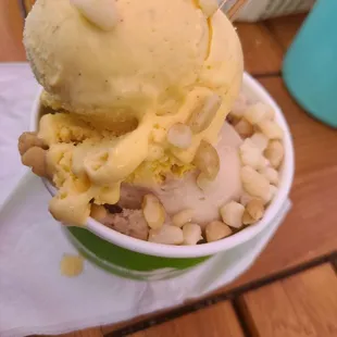 pumpkin cheesecake and coffee with mac nuts on top