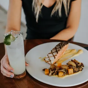 a plate of food and a drink