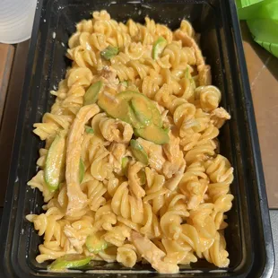 Fusilli pasta with chipotle sauce and chicken and asparagus