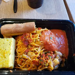 Shrimp with angel hair pasta.