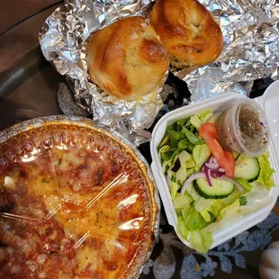 Delicious garlic rolls, side salad, and Il Gusto Special (meat lasagna, manicotti, stuffed shells,) for about $14.