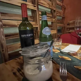 Wine. sparkling water and the fresh parm! Sprinkle your own and as much as you want