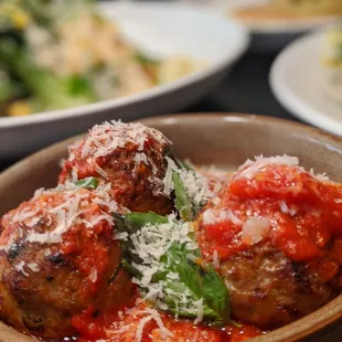 Meatball appetizer with house made spicy pomodoro sauce.
