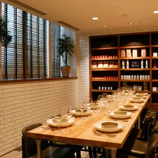Private dining space inside house-made glass pasta room.