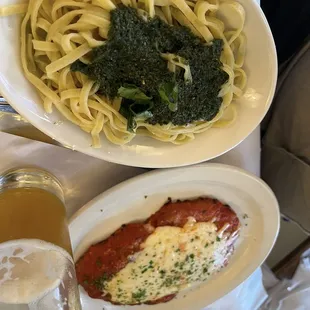 Veal Parmesan with side of linguini with pesto sauce