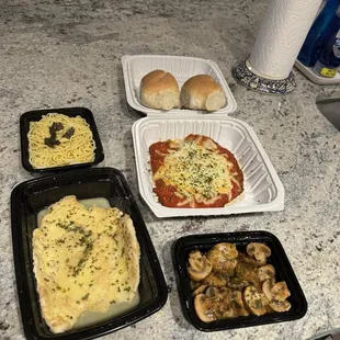 Chicken Francese, Chicken Parmigiana, and sautéed mushrooms