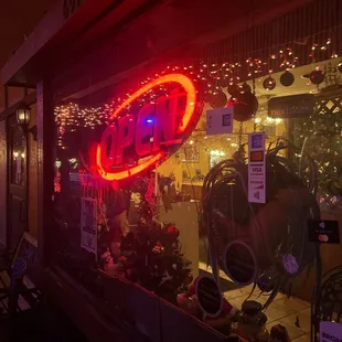 a neon sign in a shop window