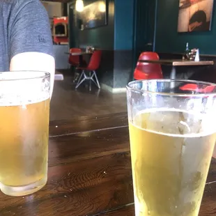 Inside.  Having beer on tap while we wait for pizza.