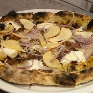 White pizza: bacon, apple, onions.