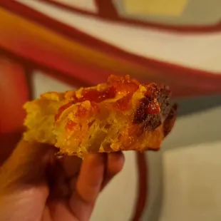 Inside the Detroit Style Pan Pizza - soft and fluffy inside with a crispier crust
