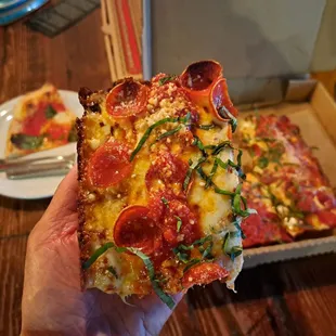 Detroit Pan Pizza #1 with pepperoni, chili flakes, hot honey, fresh basil, and Parmesan.