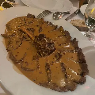 Steak with peppercorn sauce