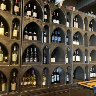 a wall of wine bottles