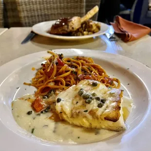 Dinner Special: Seabass w/capers and cream sauce (melts in your mouth) served with sweet tomato linguine a must try!