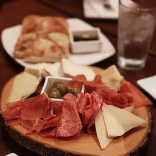 a platter of meat and cheese