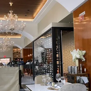 a dining room with a chandelier