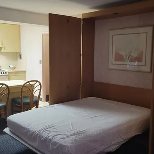 Note the broken hinge at the top of the door