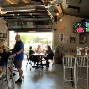 Indoor area with garage door to outdoor