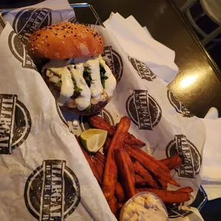 Kingpin Birria burger with delicious sweet potato fries