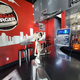a skeleton at the bar