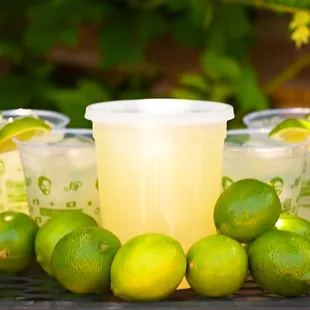 limes and lemons on a table