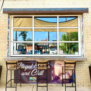 two chairs and a window