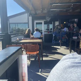 Outside seating on a nice balcony.