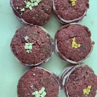 a close up of a hamburger