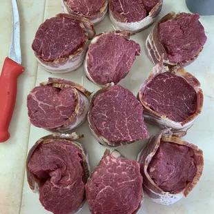 a cutting board with a knife